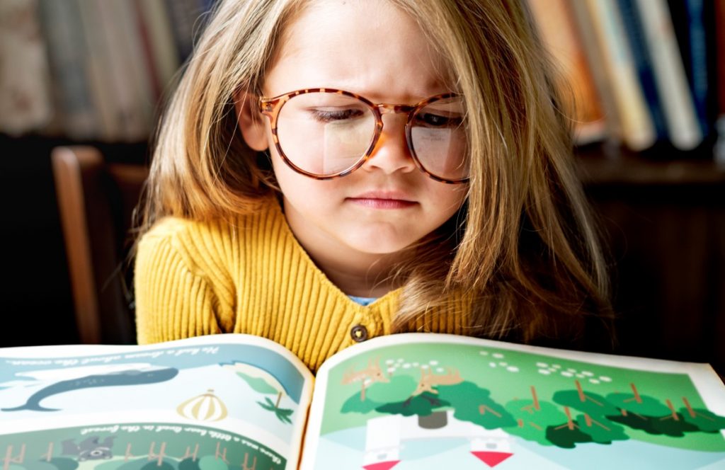 user-story User story kid reading a book