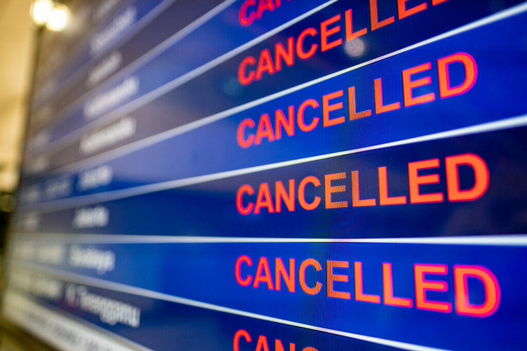 What every Product Manager should learn from the Southwest fiasco "cancelled" written on the big screen at an airport or train station