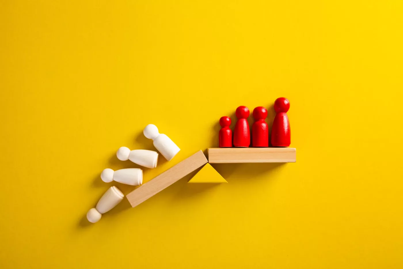 White shapes falling off the scale while red ones remain standing
